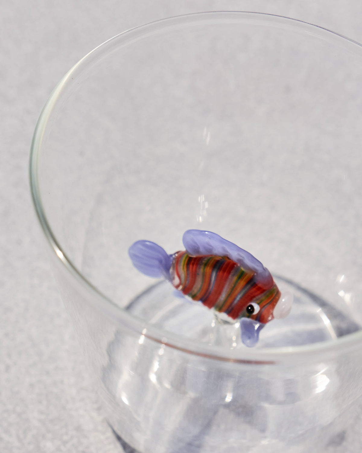 Angelfish Glass seen from above, with its striped glass fish inside.