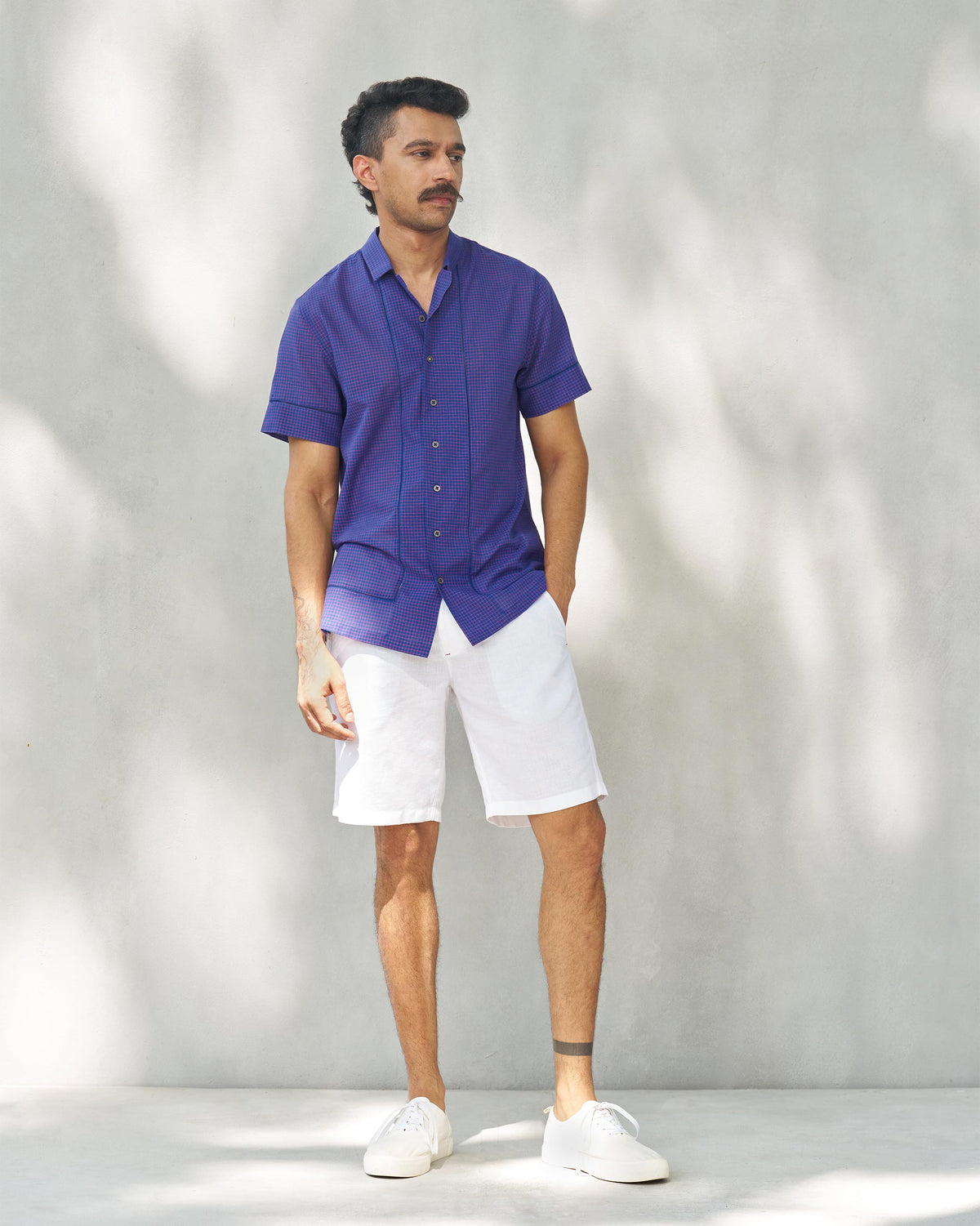 Full-length view of a Coastal Shirt with short sleeves worn by a person.