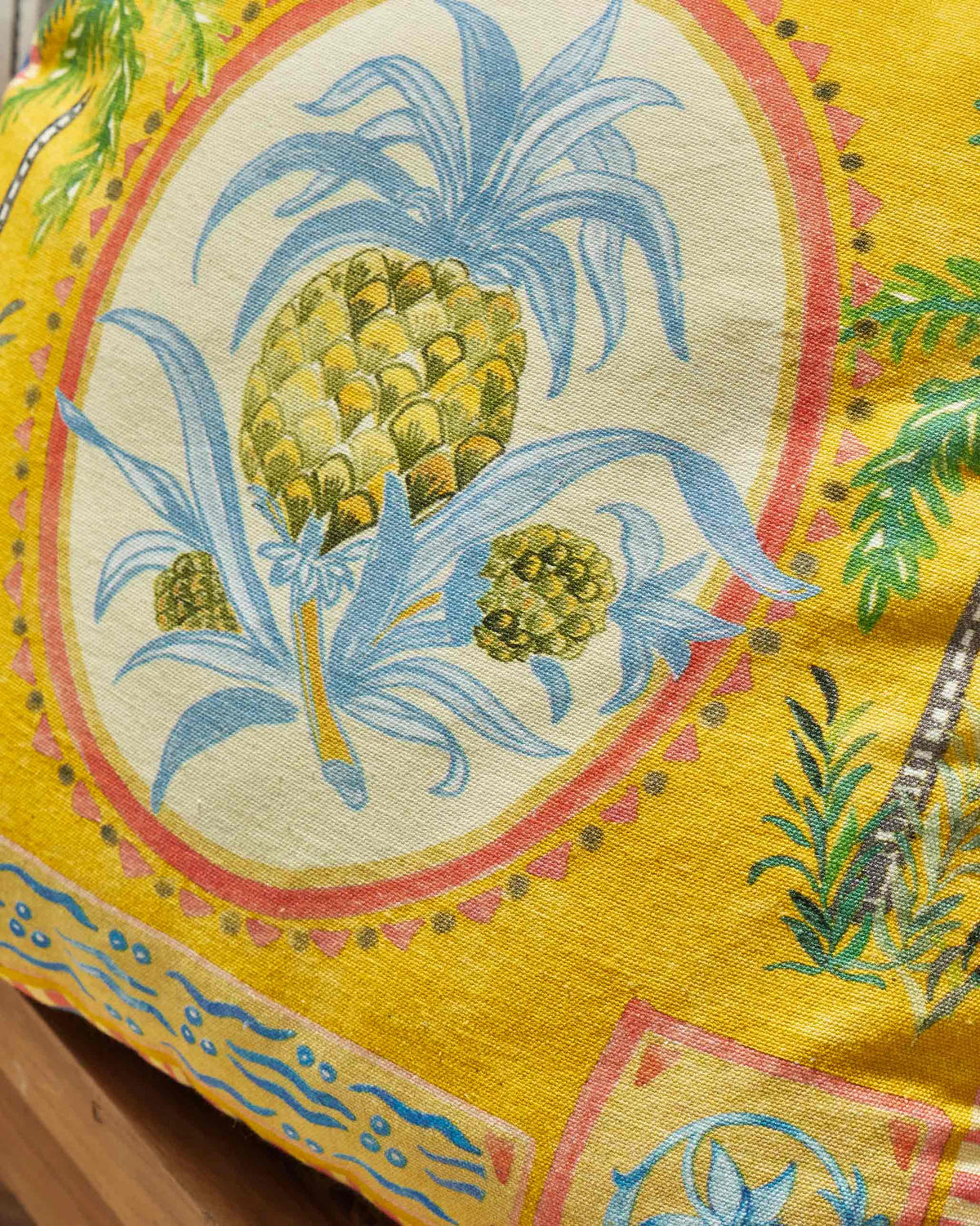 Close-up of the Pineapple Stamp Cushion Cover showing the pineapple medallion print.
