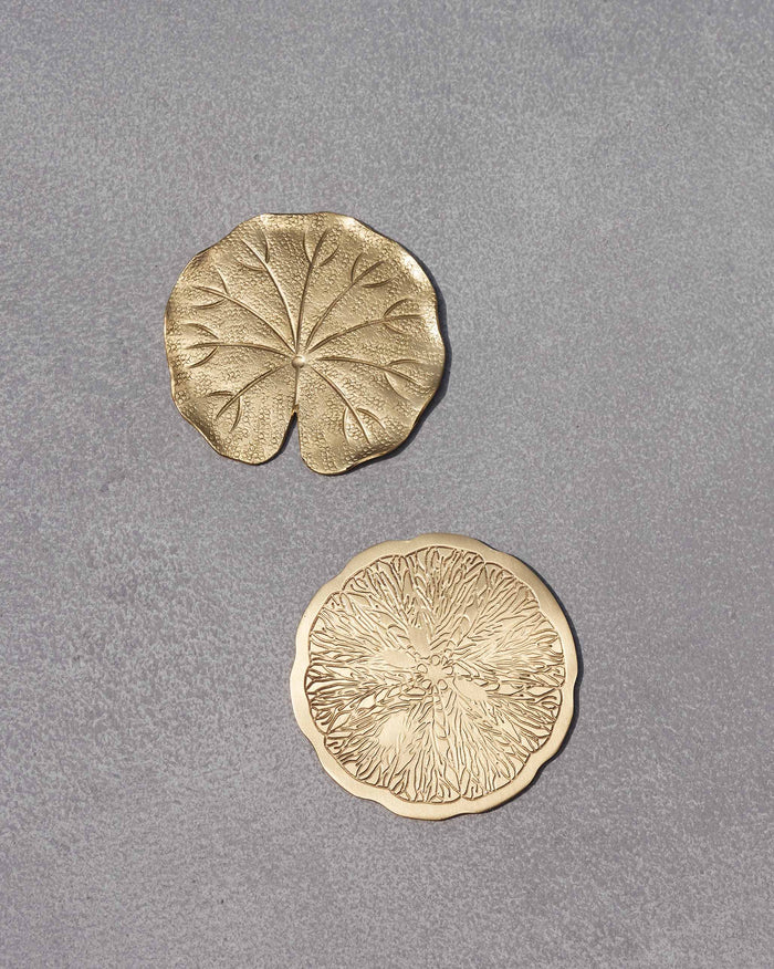 Pair of Tangerine Coasters, one leaf-shaped and one scalloped round.