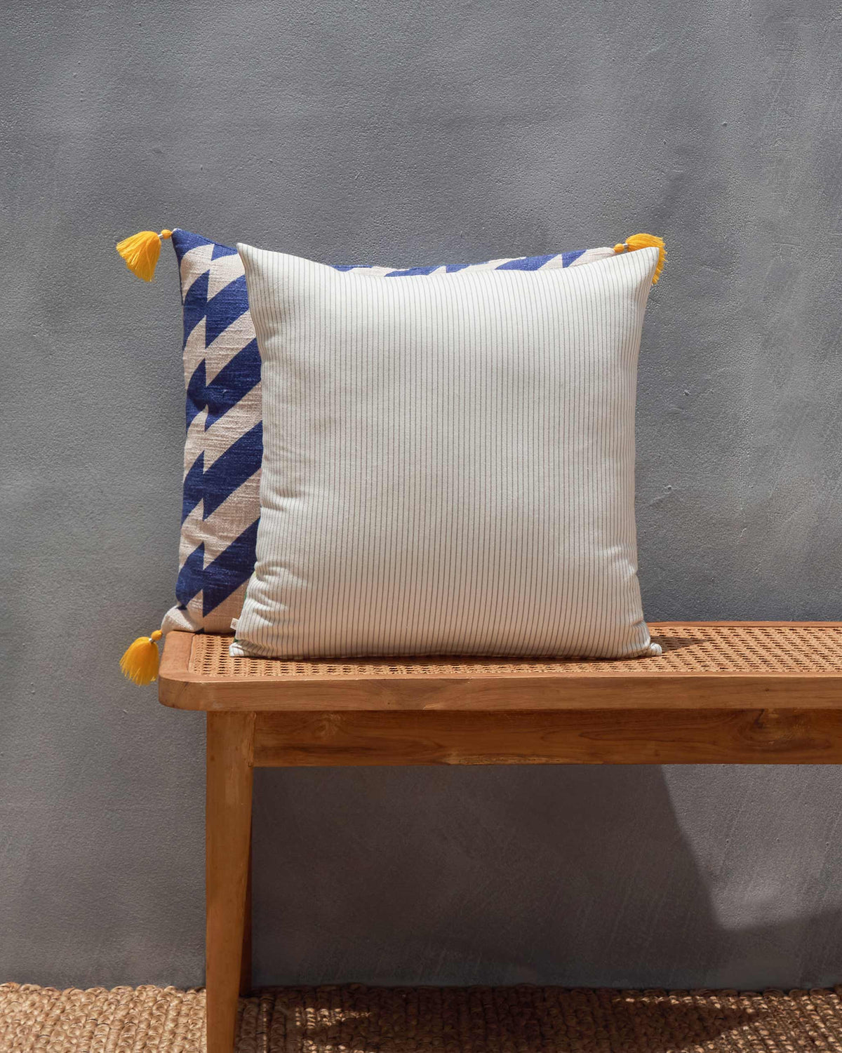 Back of the Sahara Striped Cushion Cover in fine grey and cream stripes.