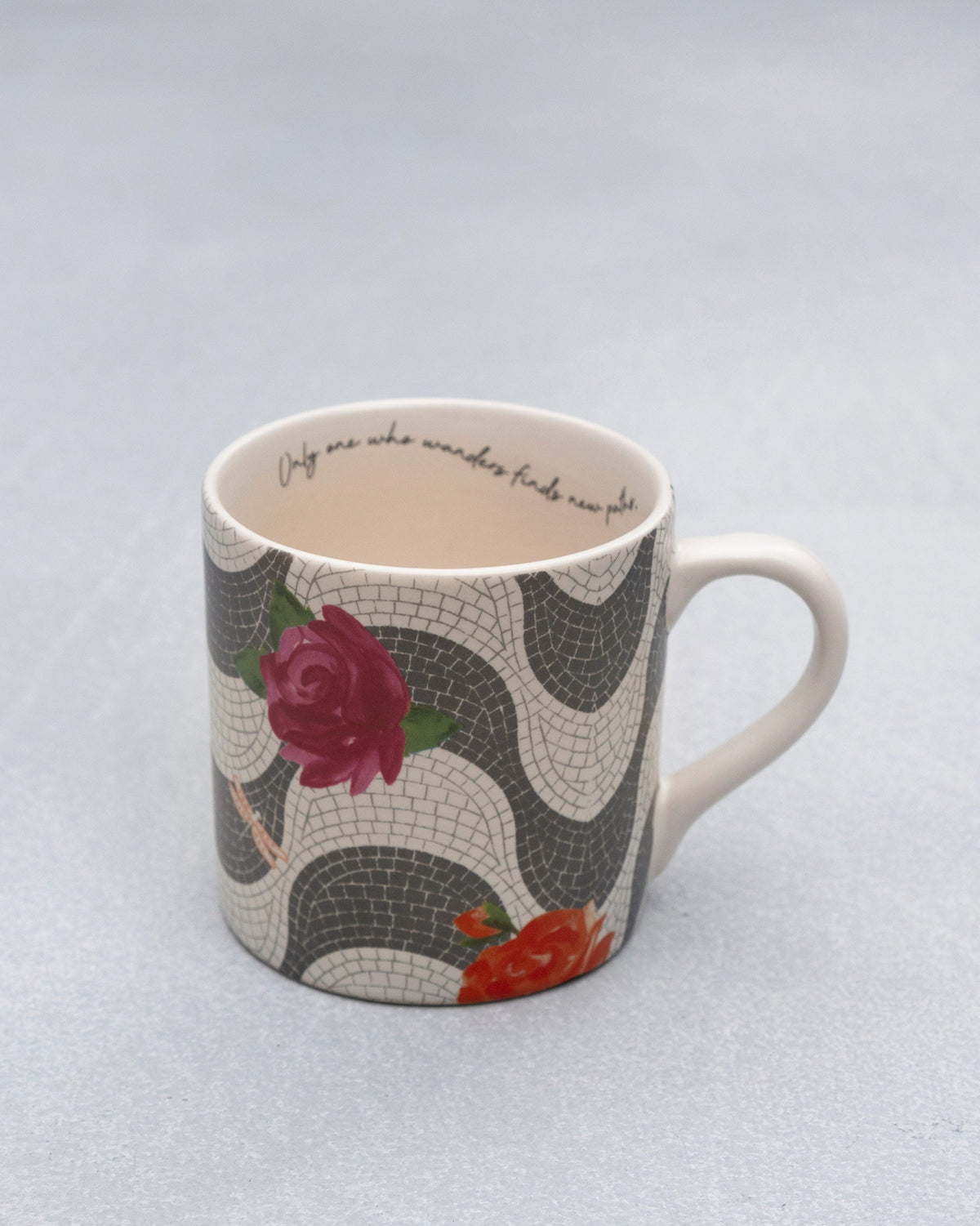 Mosaic Bloom straight mug with rose motifs and a cursive quote on the inner rim.