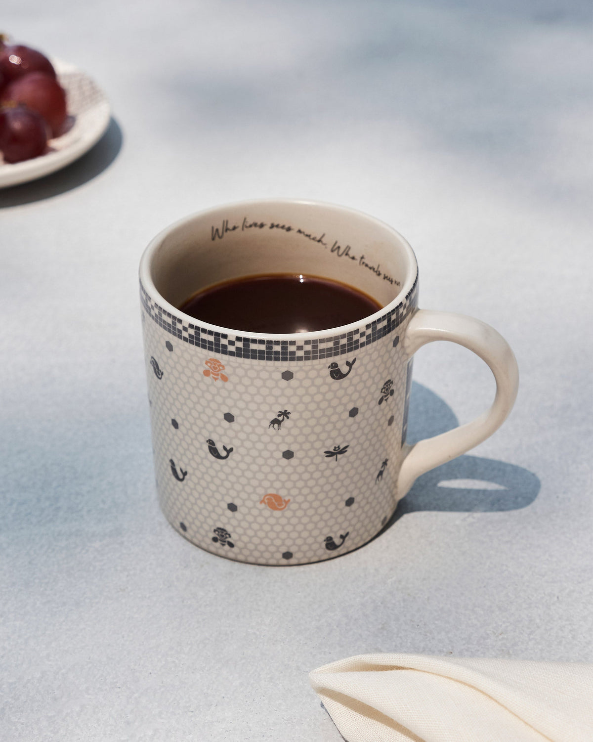 Sirocco straight mug filled with coffee.