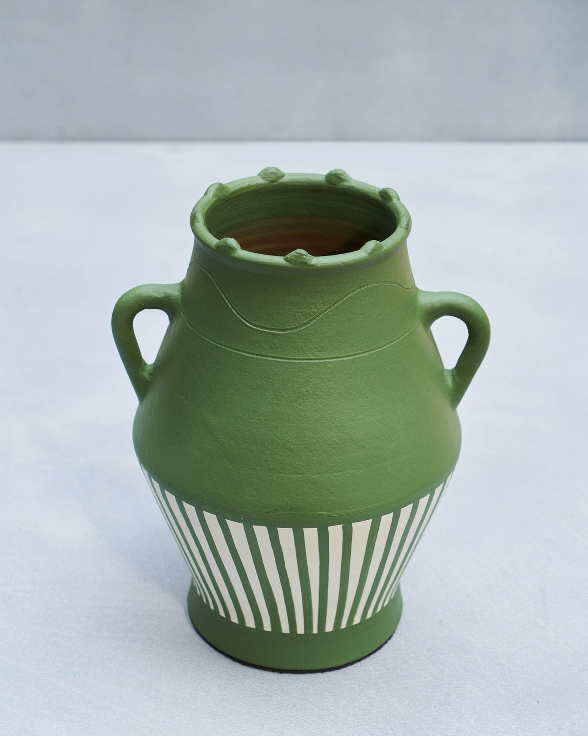 Top view of Moss Vase showing its bumped rim and open mouth.