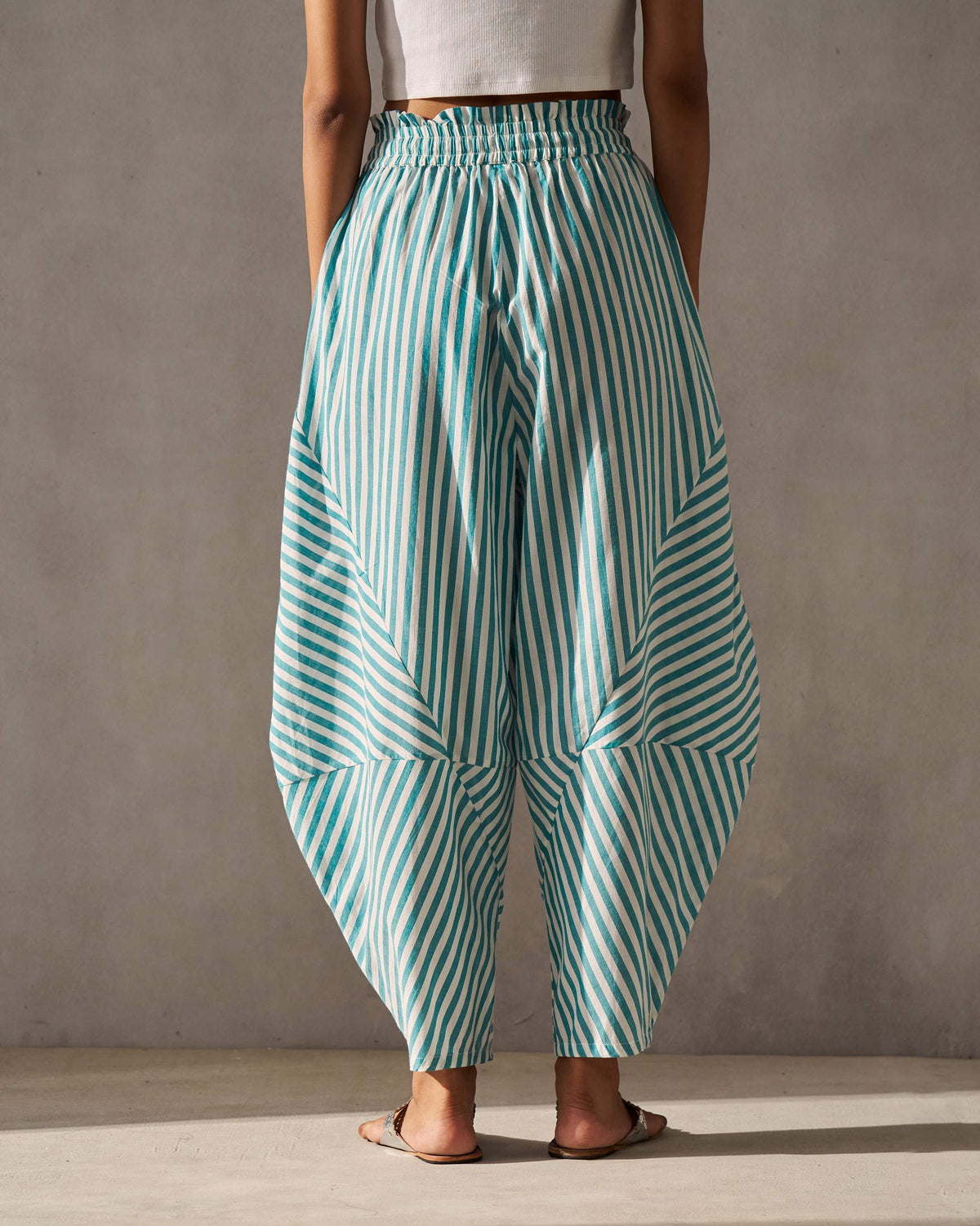 Back of the Breeze Pants with a gathered waistband, worn by a person.