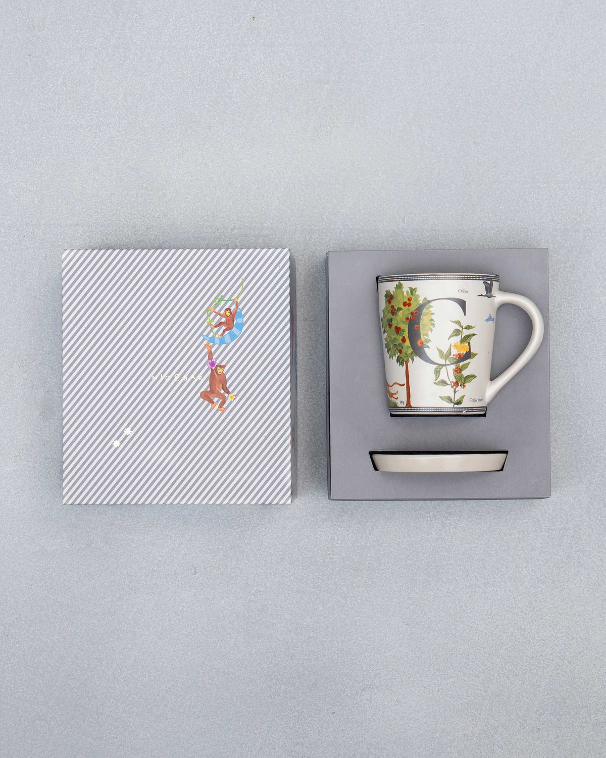 C Alphabet Set packed in an open Nicobar gift box with mug and coaster.