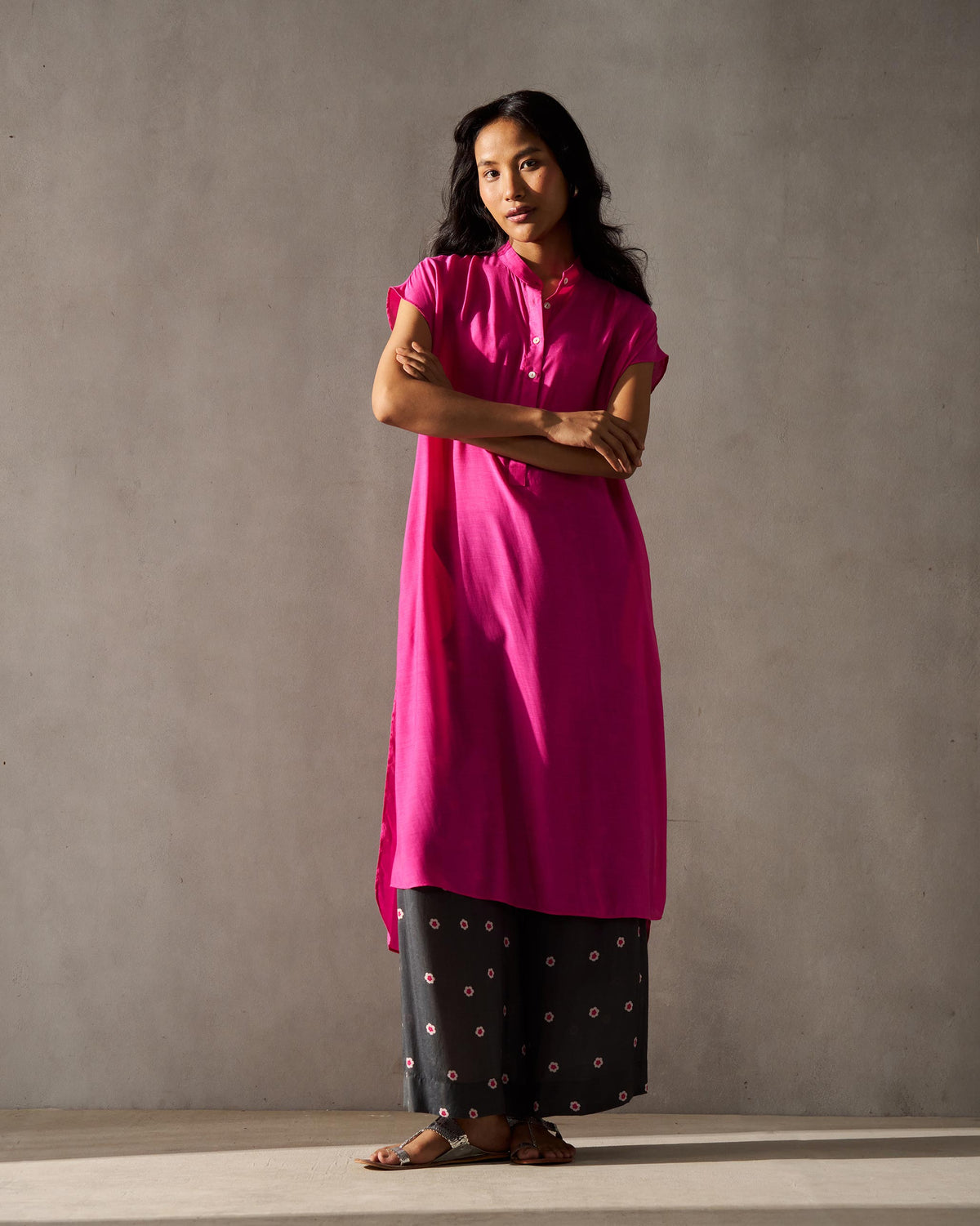 Front view of a magenta Short Sleeve Kurta worn by a person.
