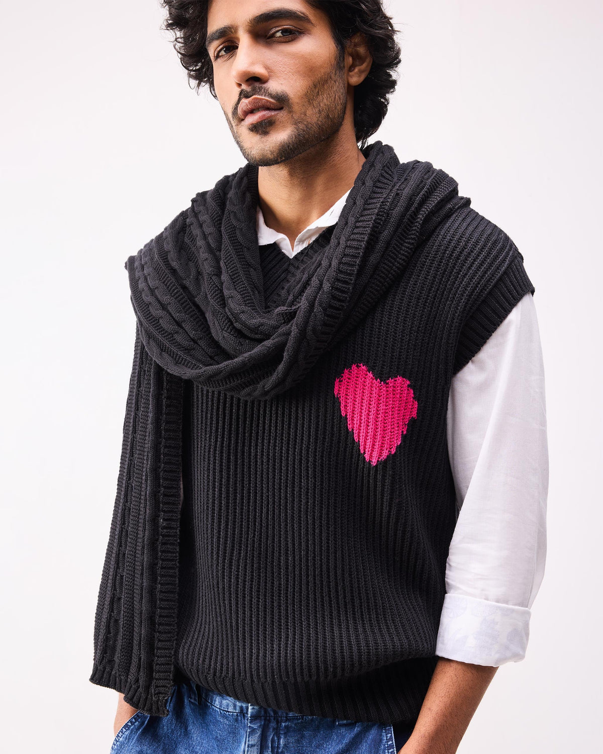 Person with the black Pippa Scarf draped over one shoulder.