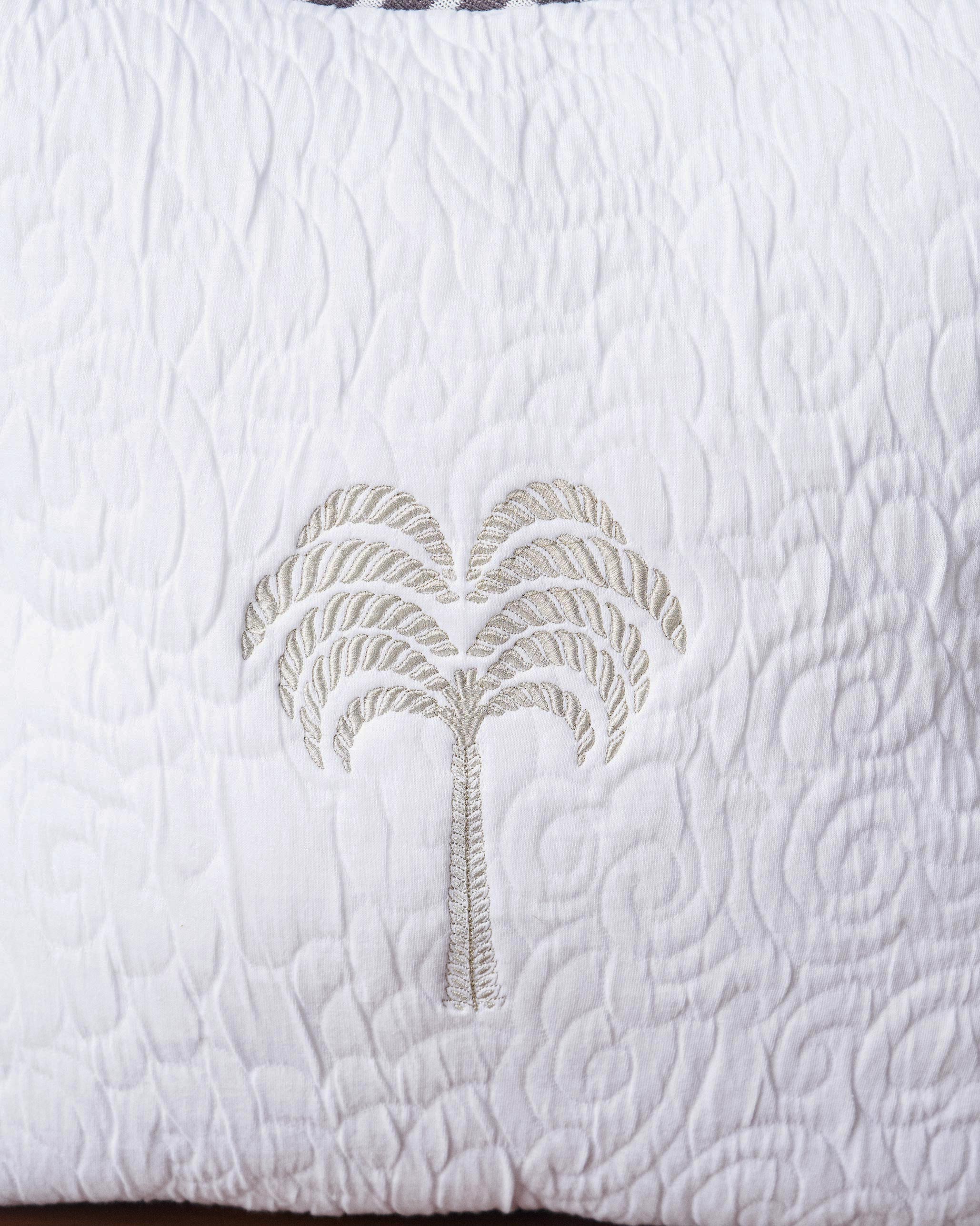 Serene Palm Quilted Cushion Cover
