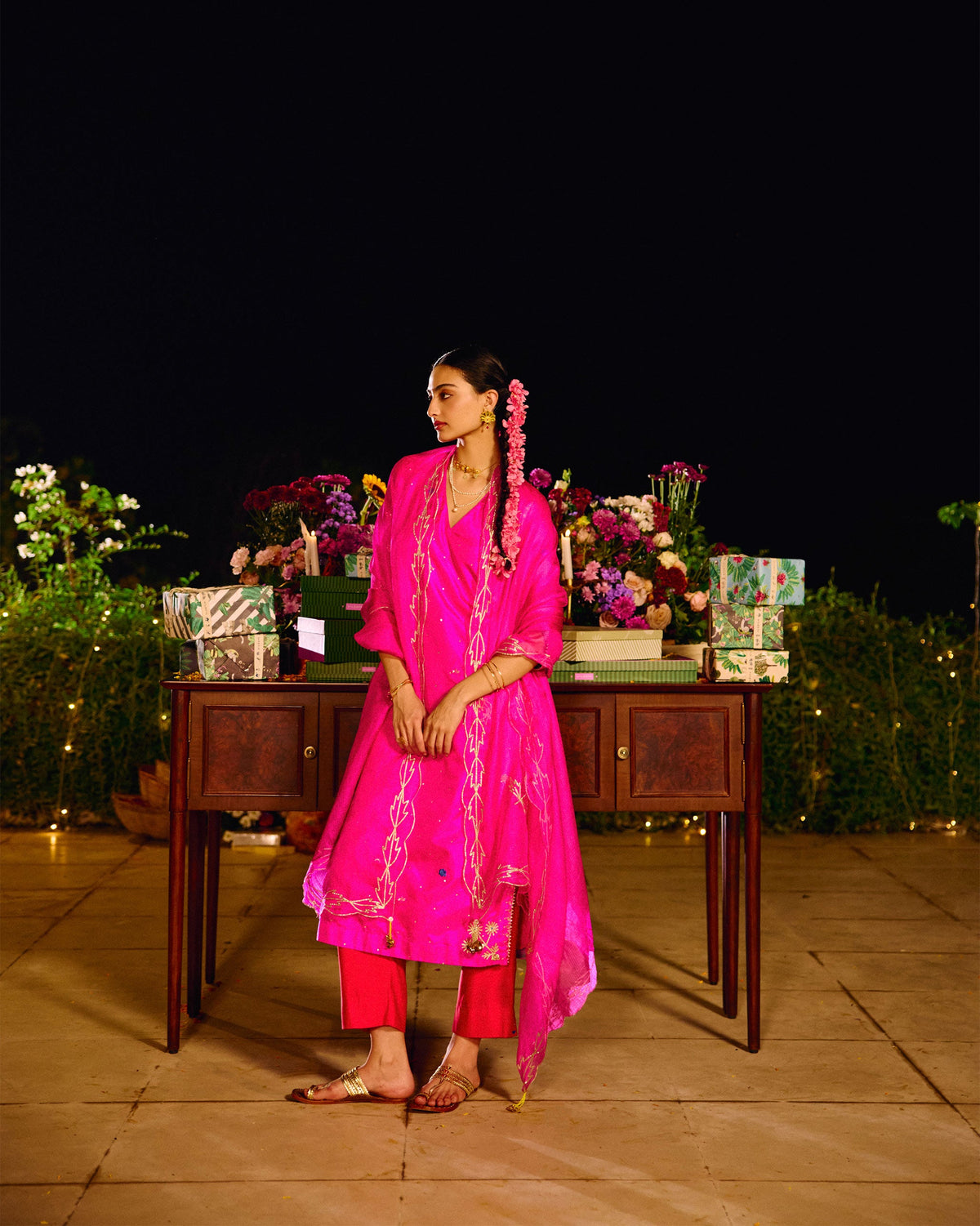 Full-length view of a person wearing a magenta Milni kurta with a pink dupatta.