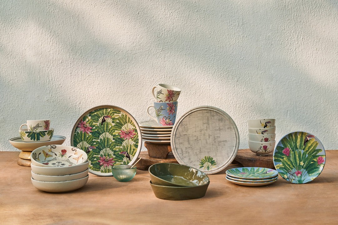 Assorted Nicobar tropical dinnerware including a Madagascar dinner plate.